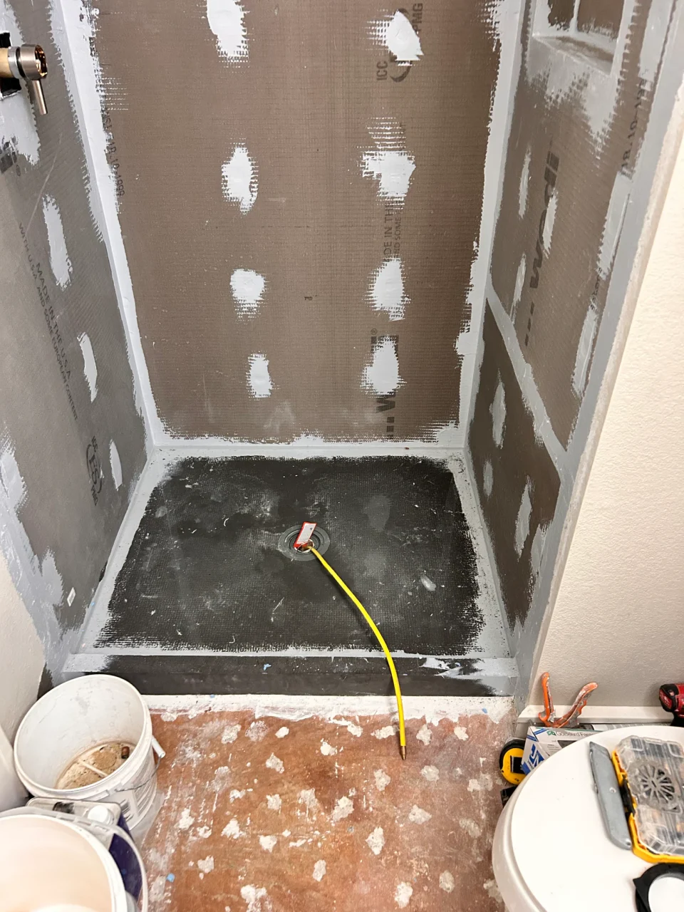 In progress: shower base and wall panels