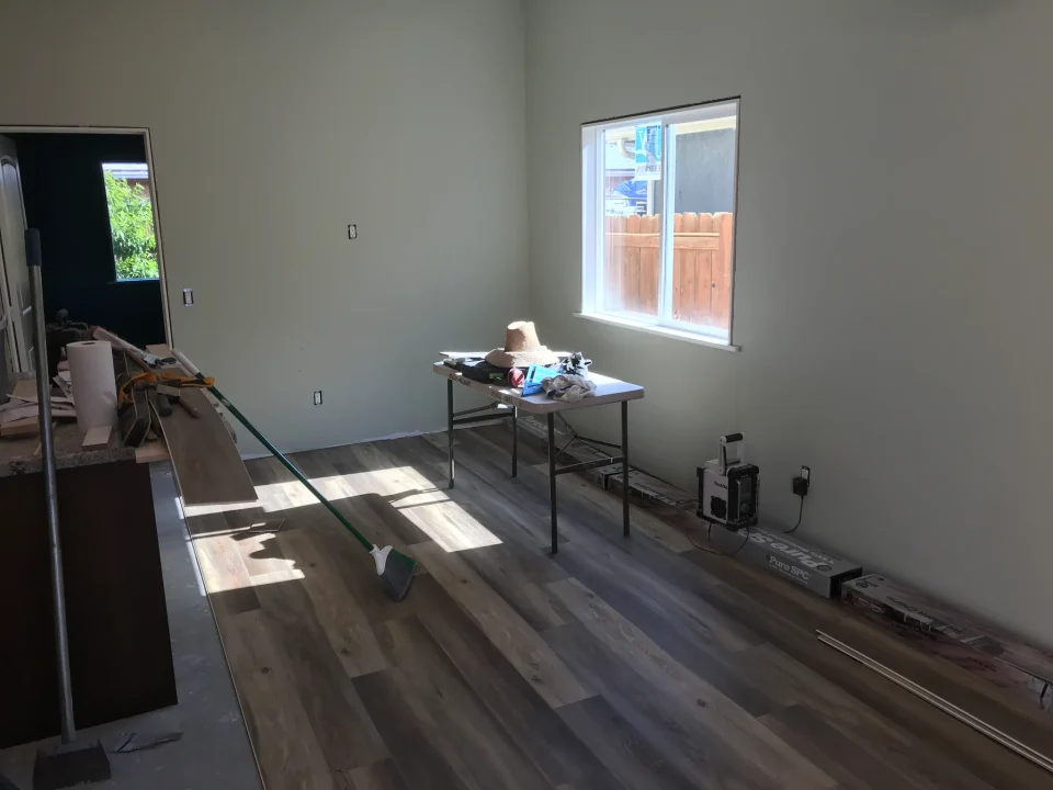 Attached ADU interior during flooring and finish work