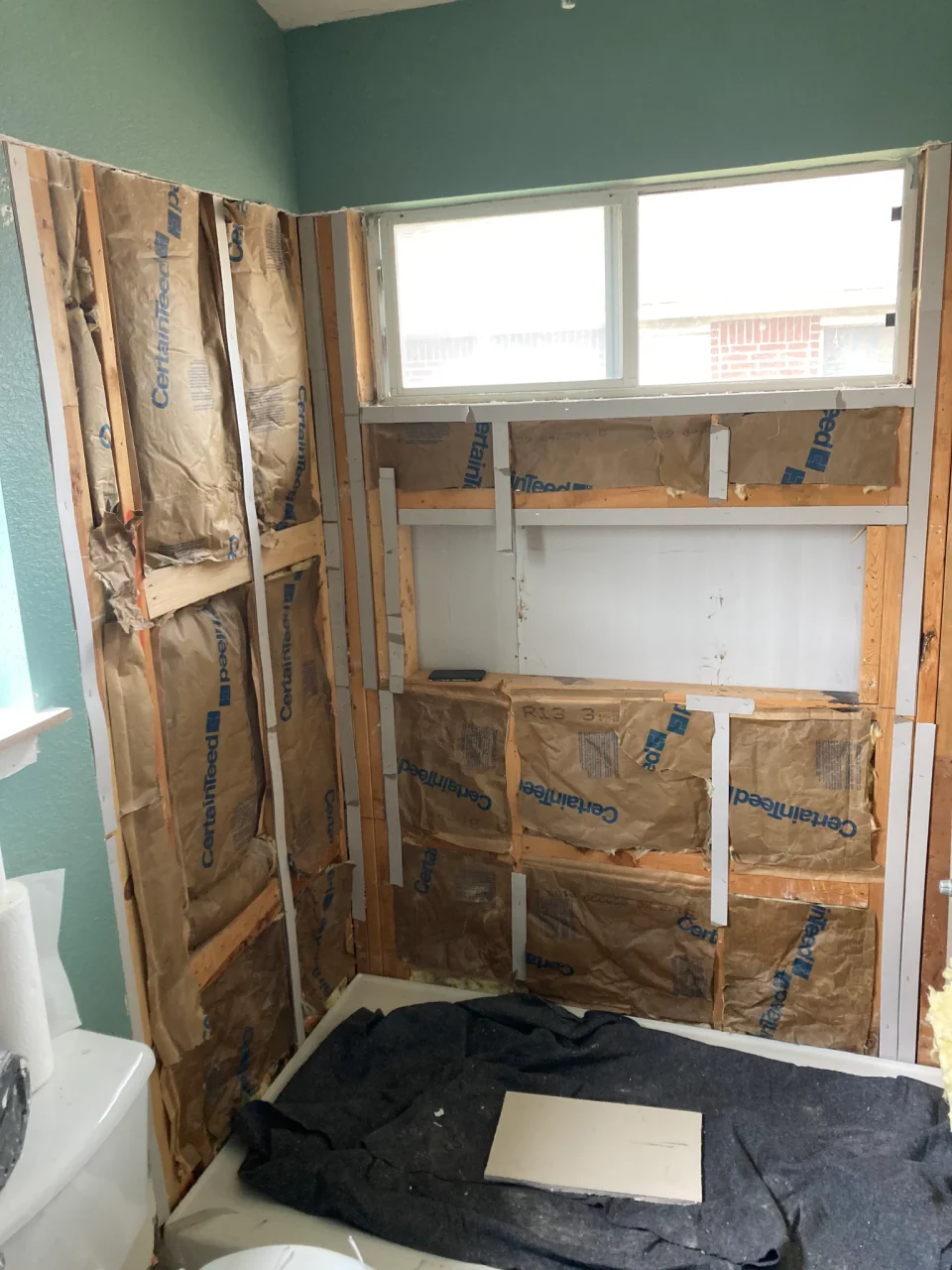 Exposed shower framing during the bathroom renovation
