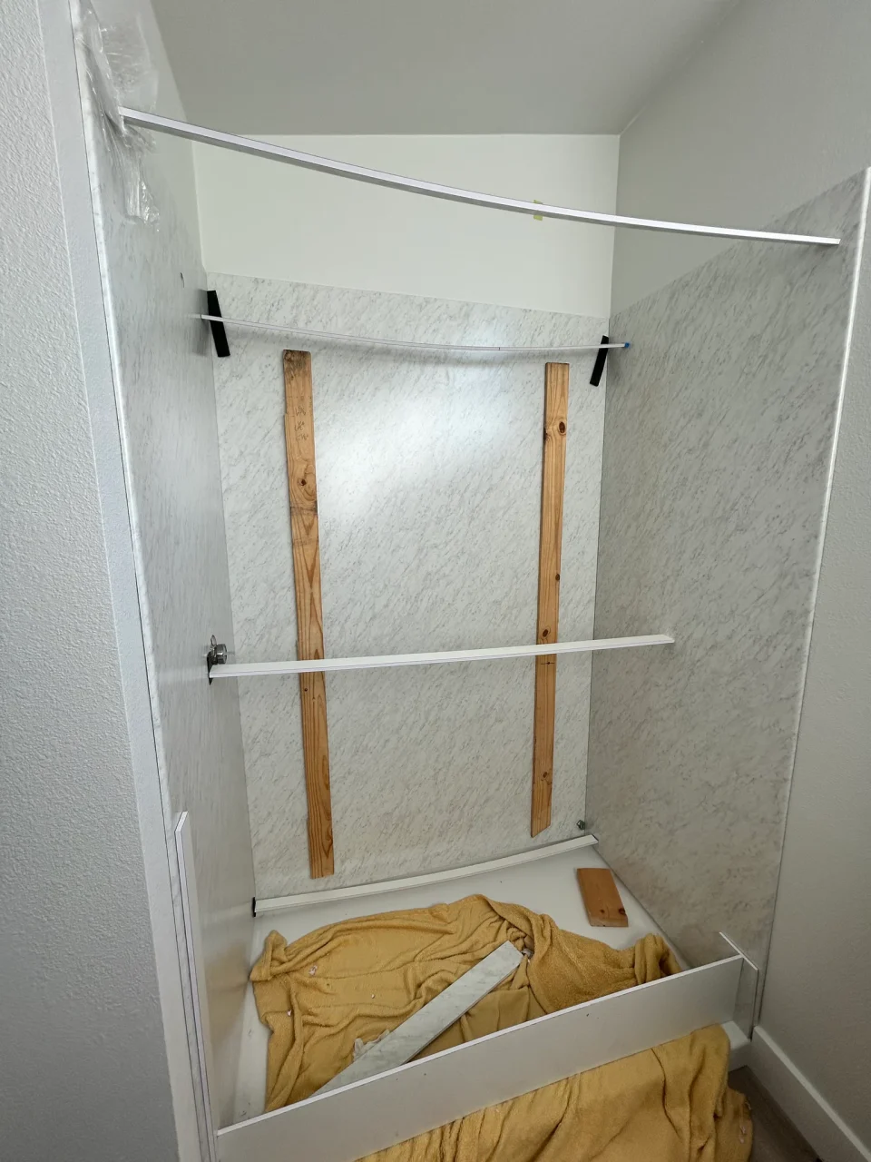 ADU shower wall panels during installation