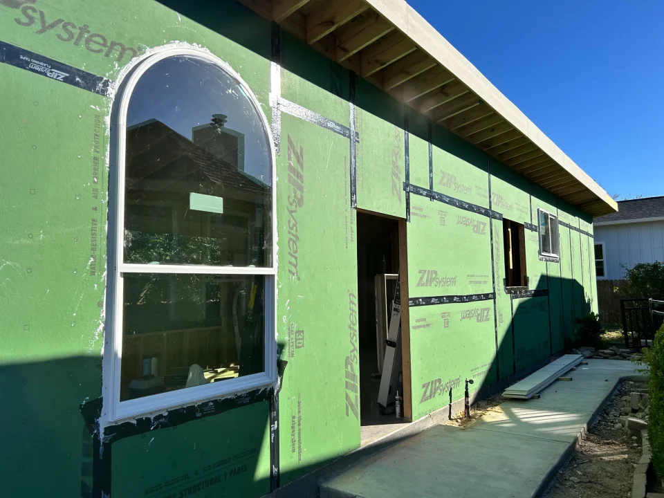 Arched window installed in the ADU wall sheathing