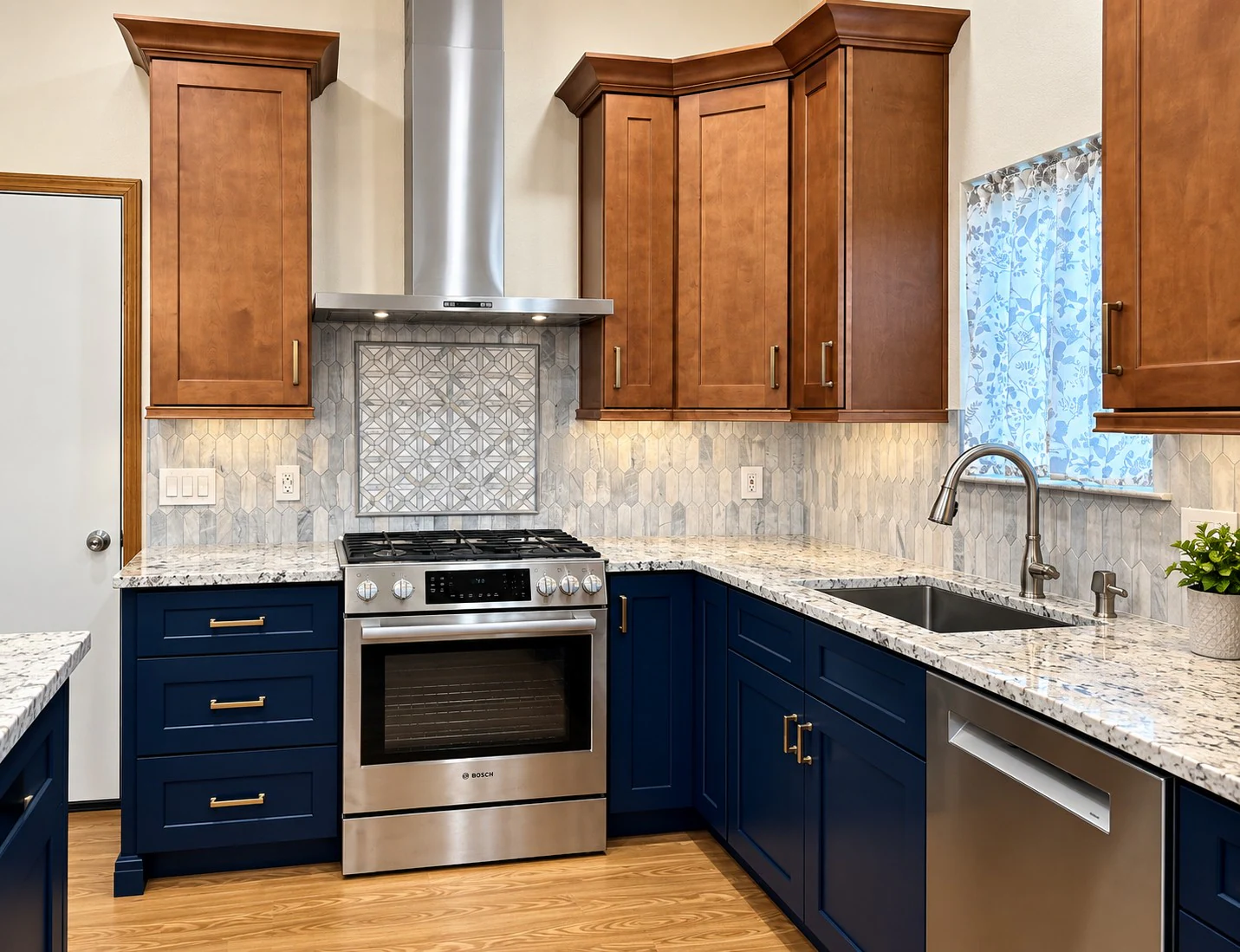Range and hood framed by wood upper cabinets