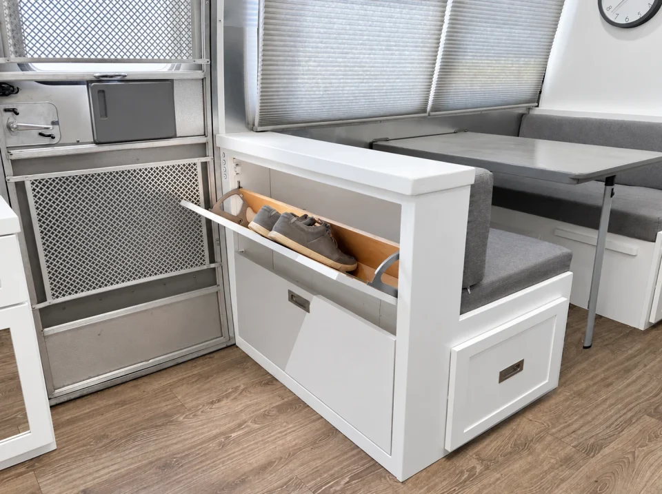 Pull-out storage beside the Airstream kitchen cabinetry