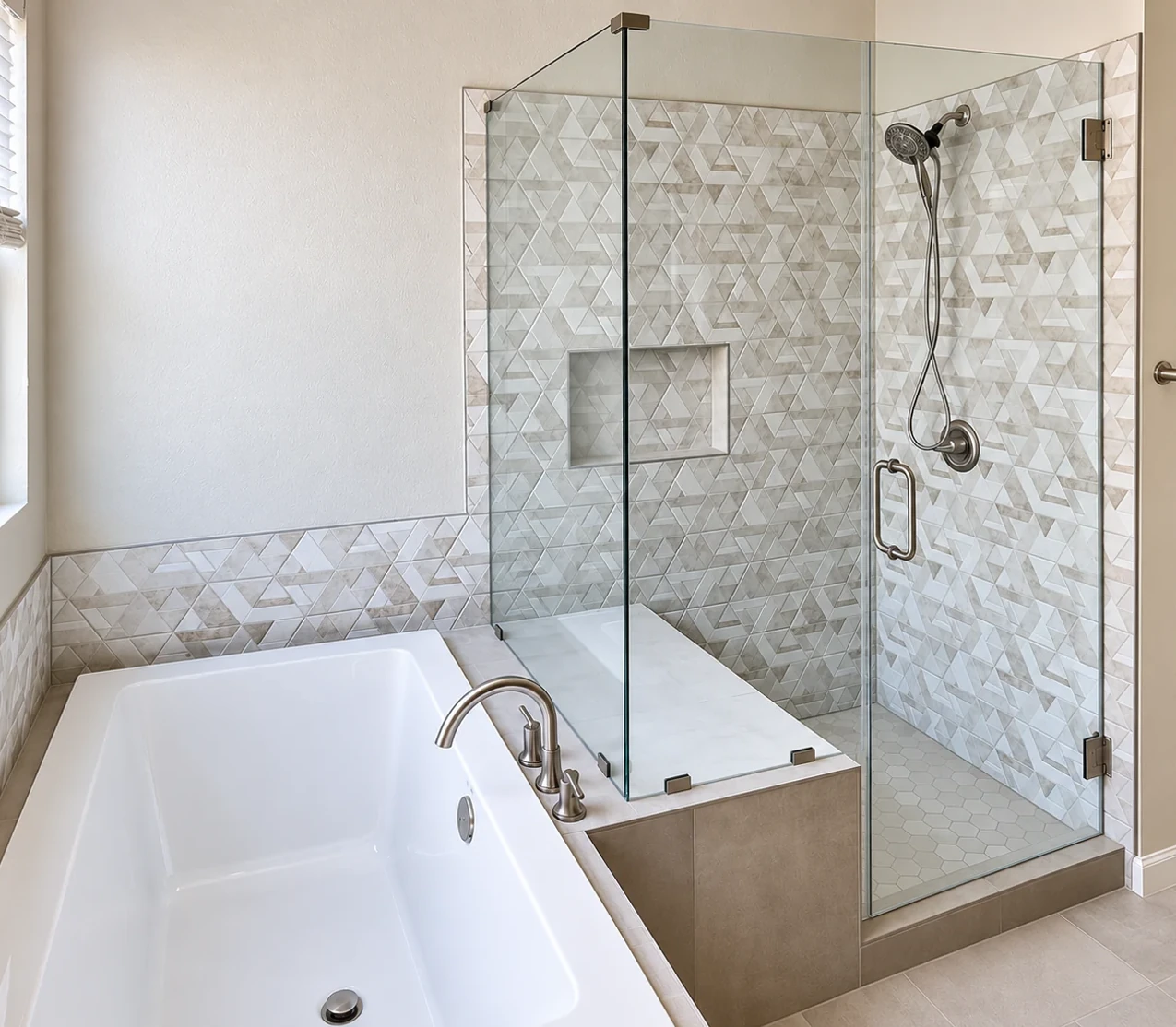 Textured-tile shower beside a white bathtub
