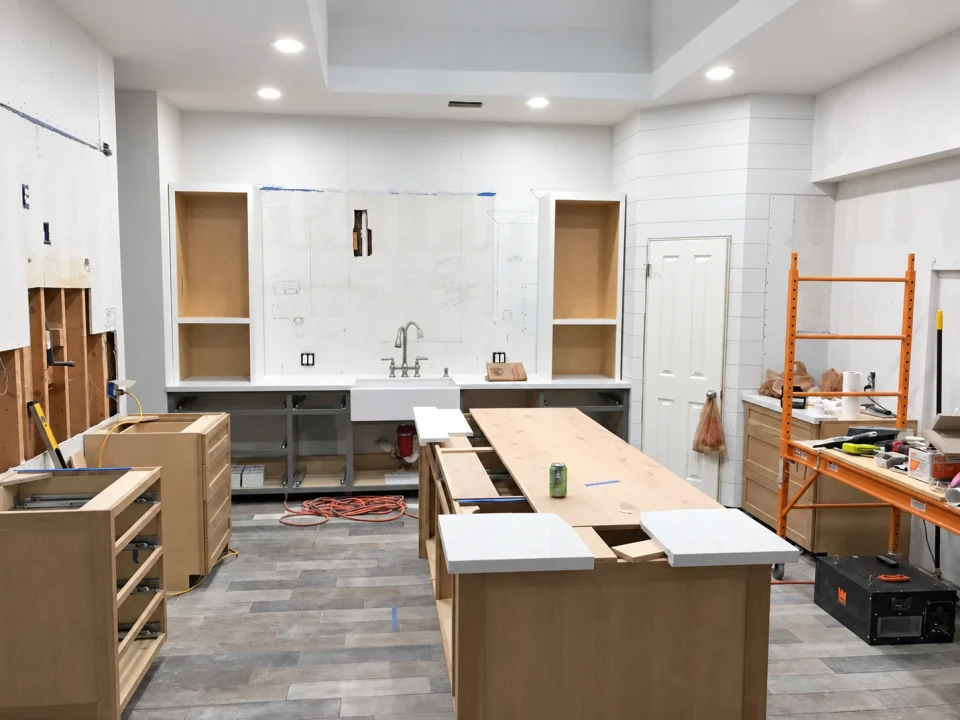Kitchen cabinetry and island during installation